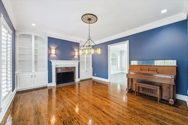 a large kitchen with stainless steel appliances granite countertop a granite counter tops and a window