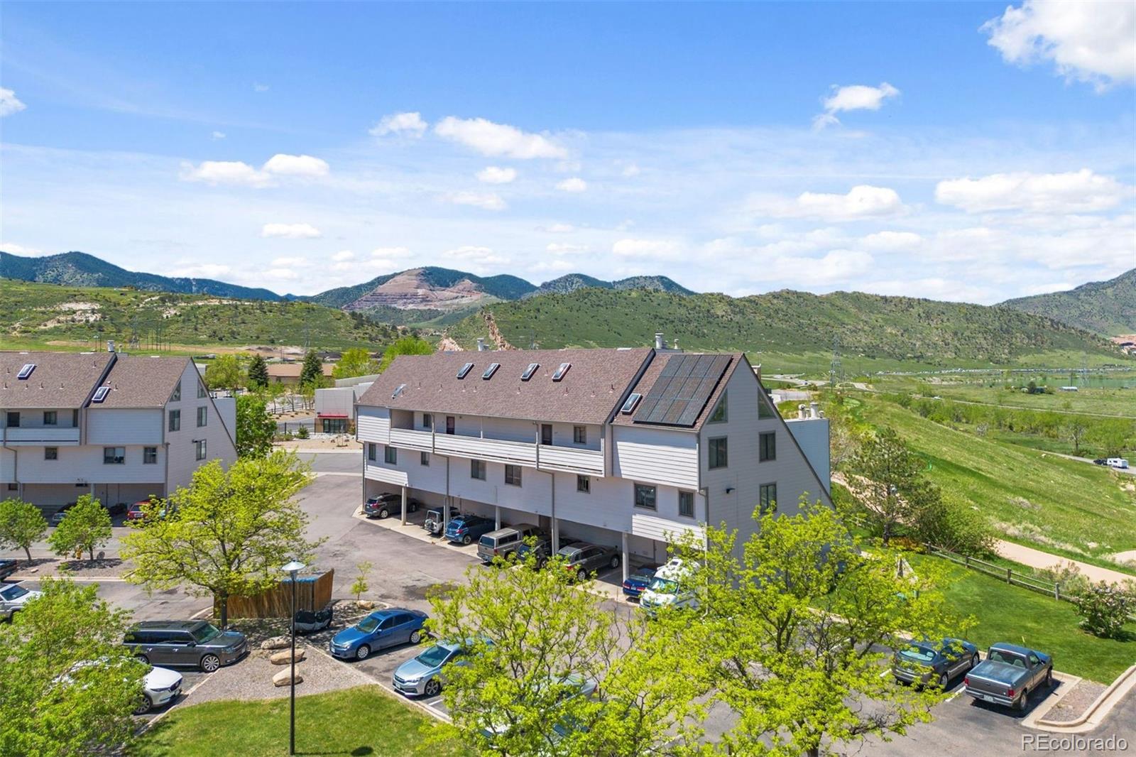 an aerial view of a house with a garden