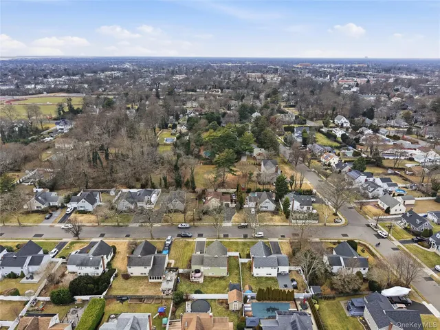 an aerial view of residential building with parking space