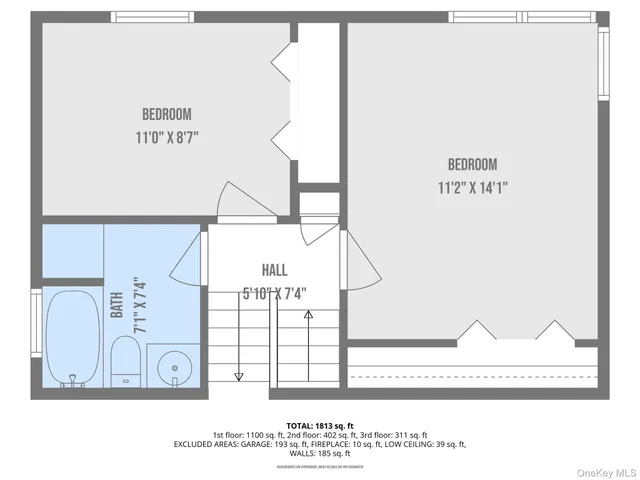 a black and white photo of a living room