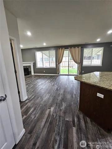 a view of a room with a sink and window
