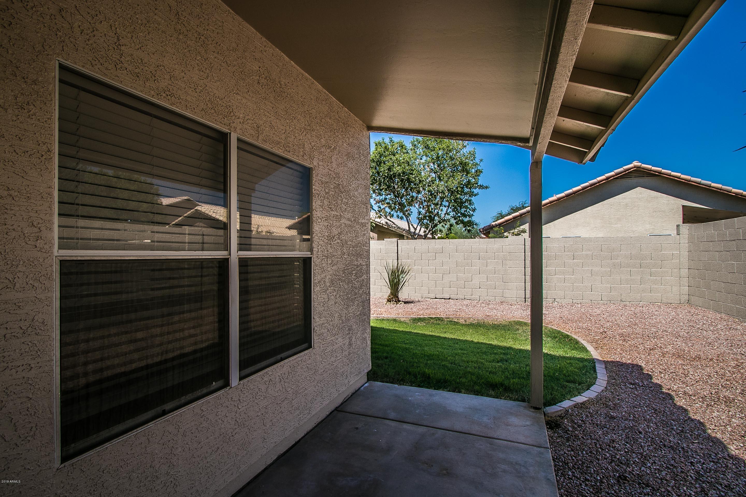3948 East Stanford Avenue Gilbert, AZ 85234 - Photo 27 of 32 a view of back yard of the house