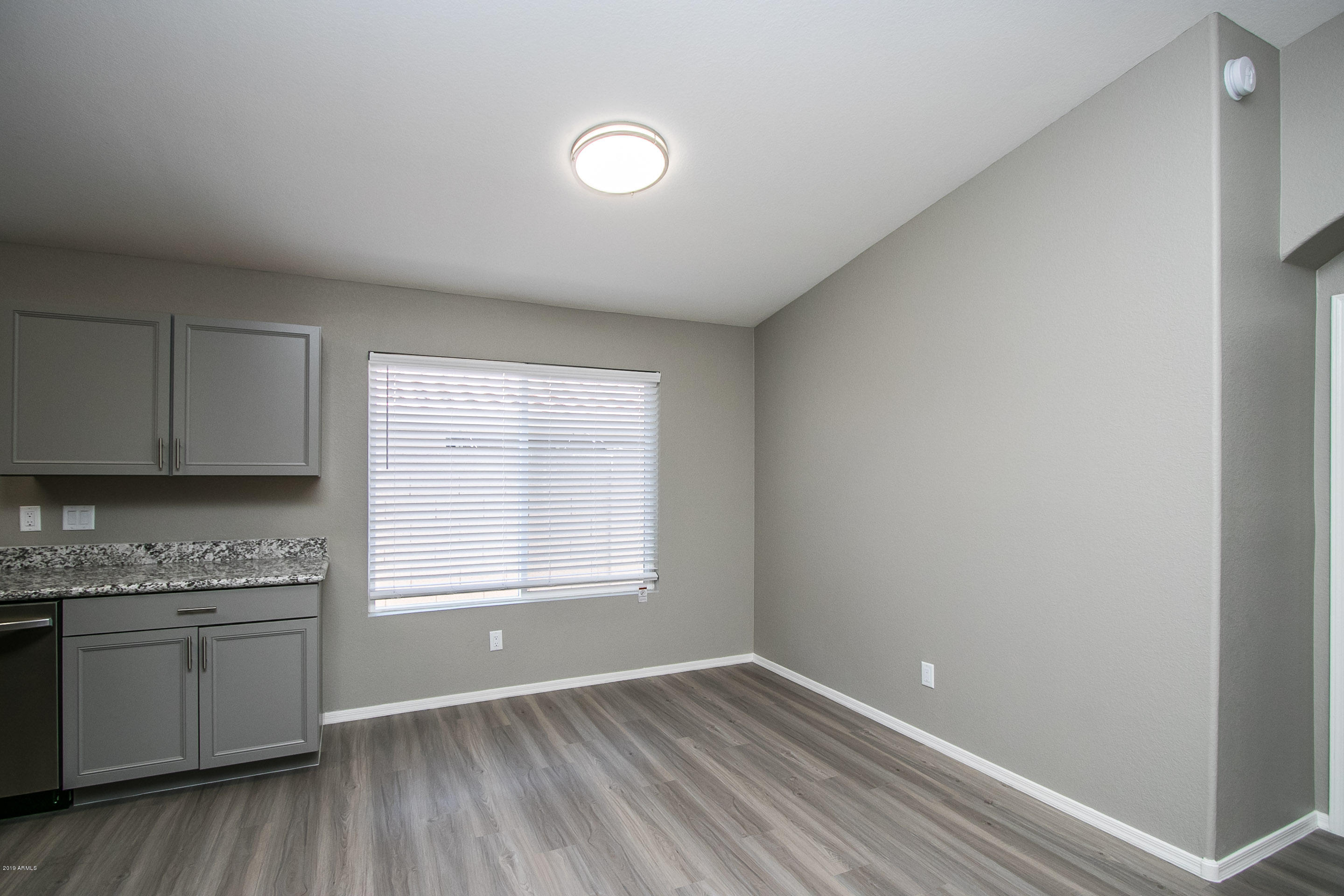 3948 East Stanford Avenue Gilbert, AZ 85234 - Photo 7 of 32 a view of a kitchen counter space and a window