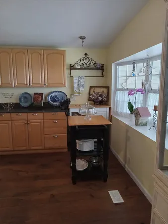 a view of a workspace with furniture