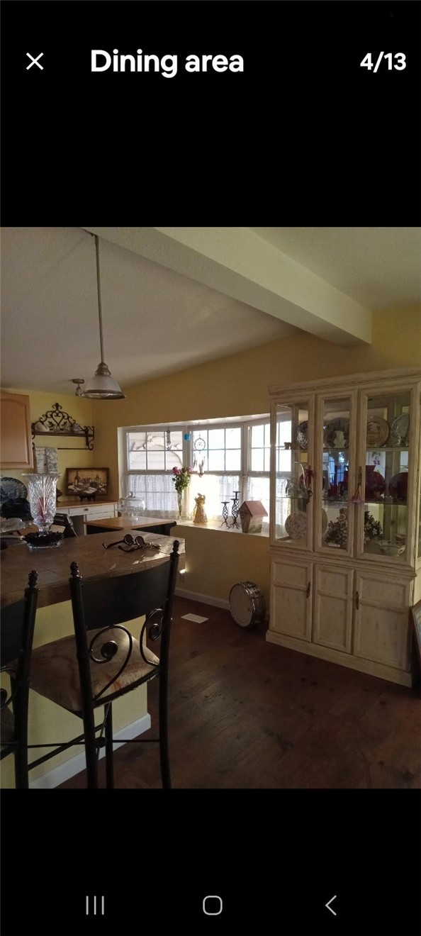 740 Lark Drive Sebastian, FL 32976 - Photo 10 of 11 a living room with chairs and a table