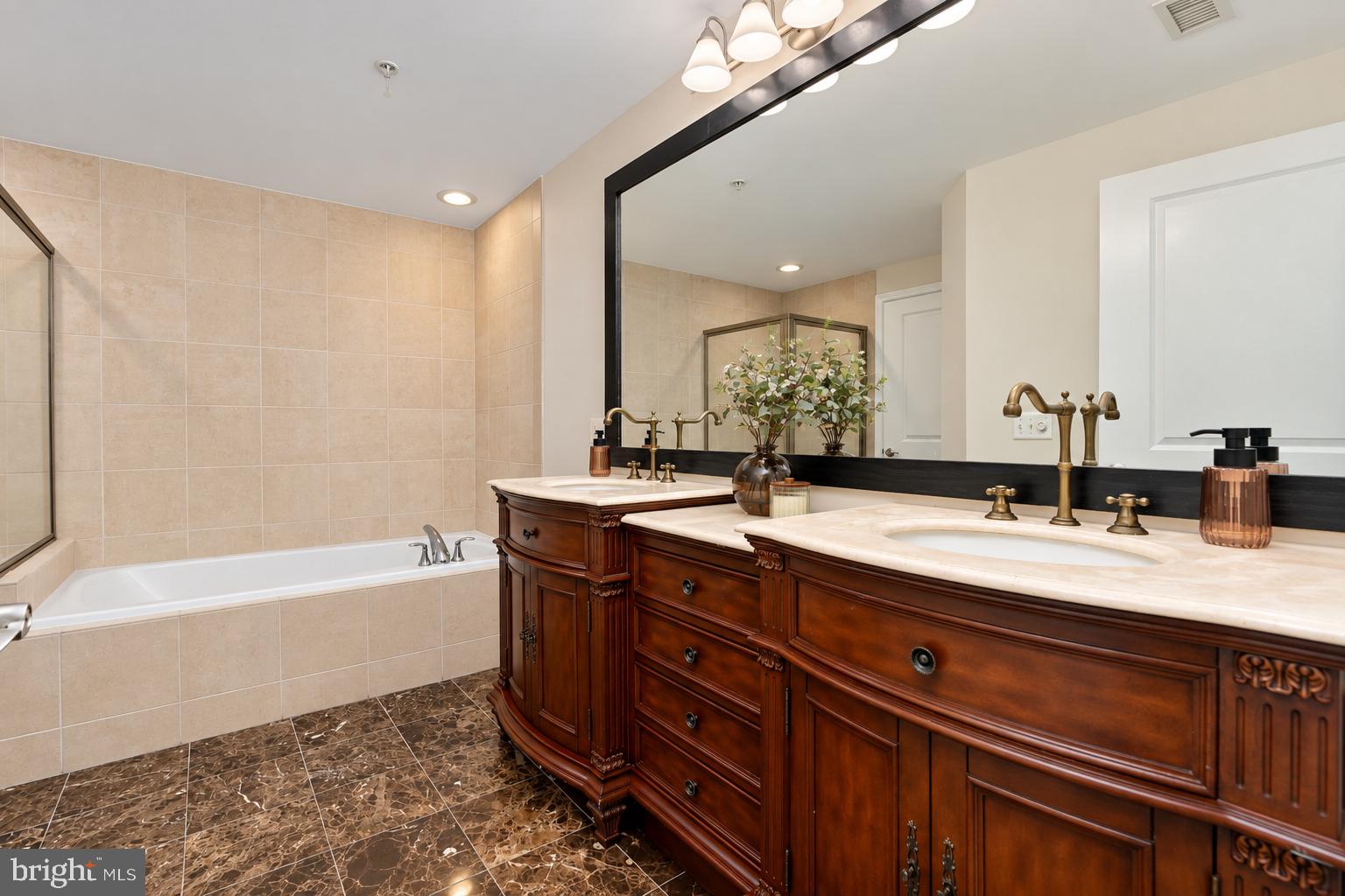 11990 Market Street, Unit 417 Reston, VA 20190 - Photo 19 of 43 Primary bathroom
