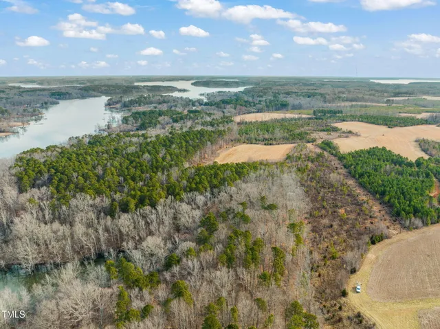 a view of a lake with a yard
