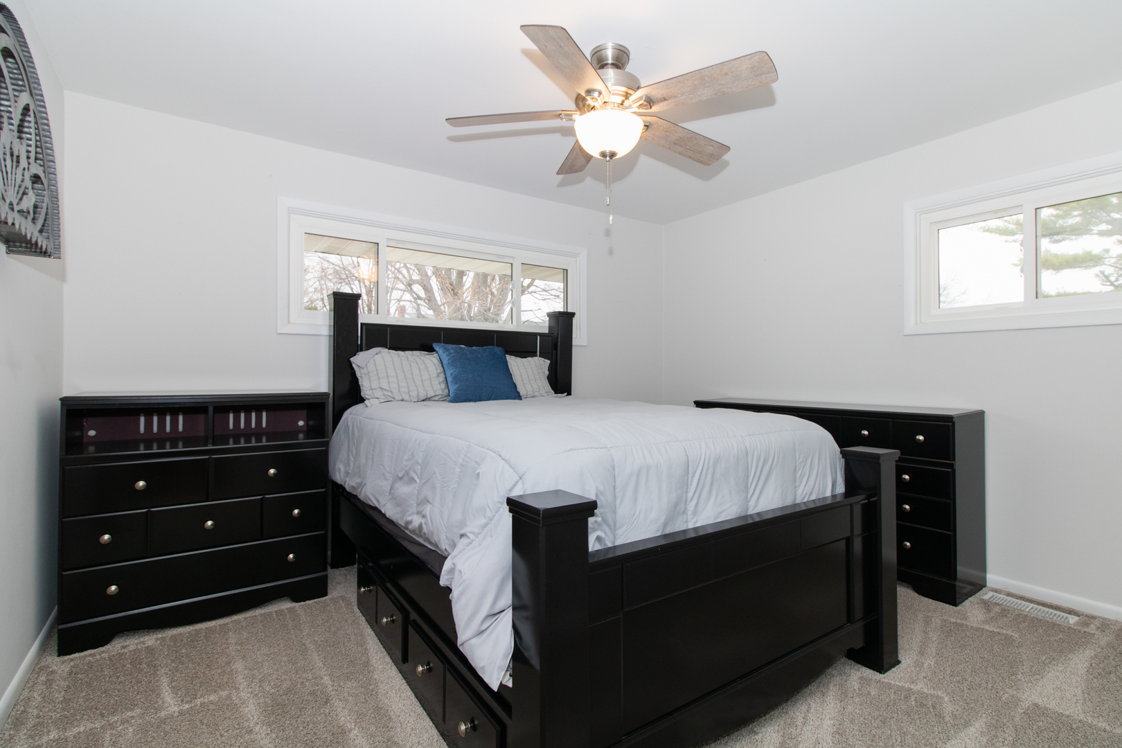 1501 Searle Drive Normal, IL 61761 - Photo 12 of 31 a bed sitting in a bedroom with a tv