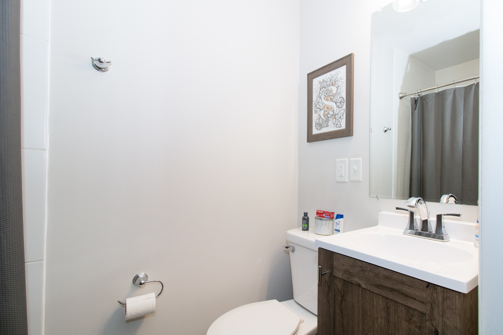 1501 Searle Drive Normal, IL 61761 - Photo 23 of 31 a bathroom with a sink vanity mirror and toilet