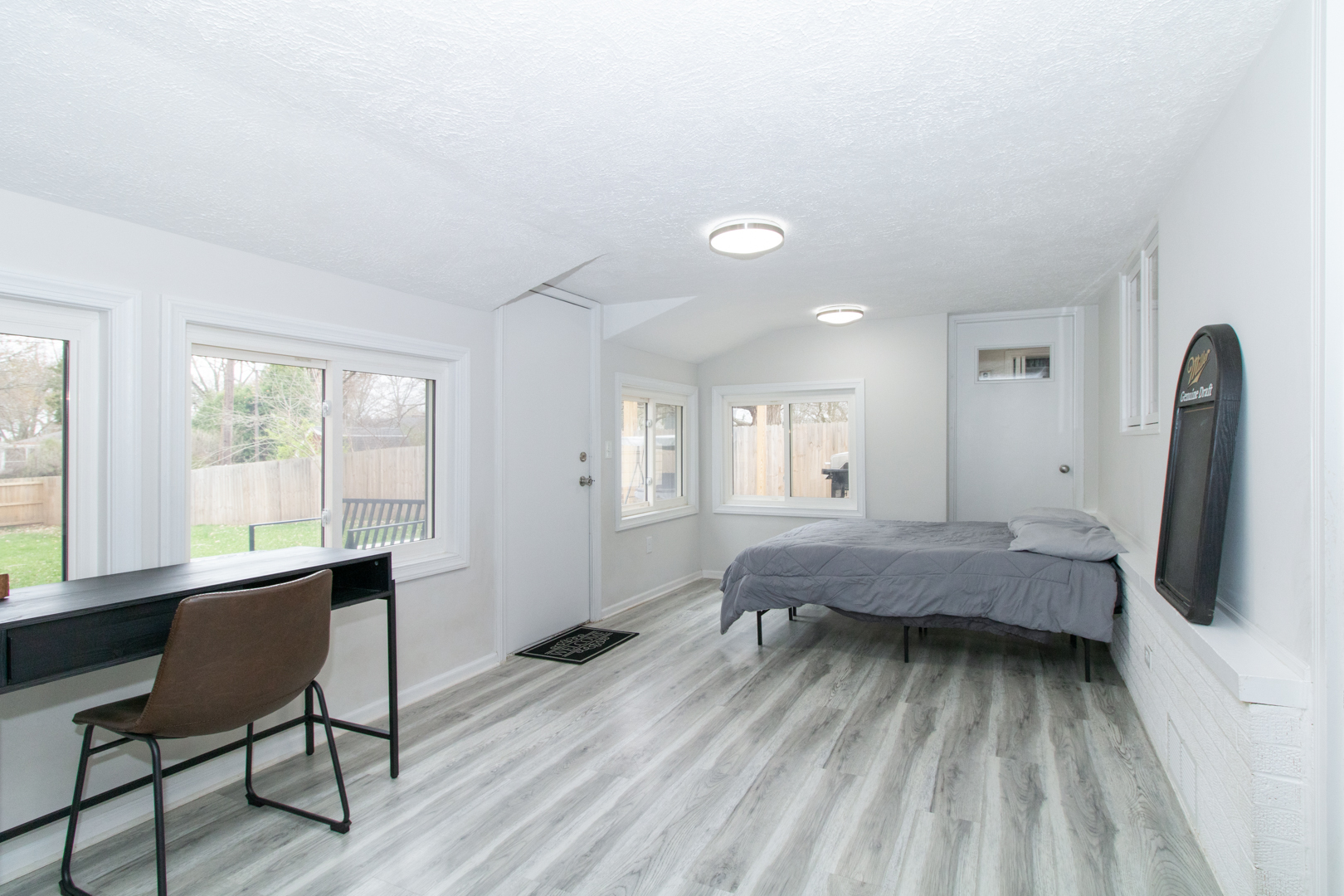 1501 Searle Drive Normal, IL 61761 - Photo 24 of 31 a living room with furniture and a flat screen tv