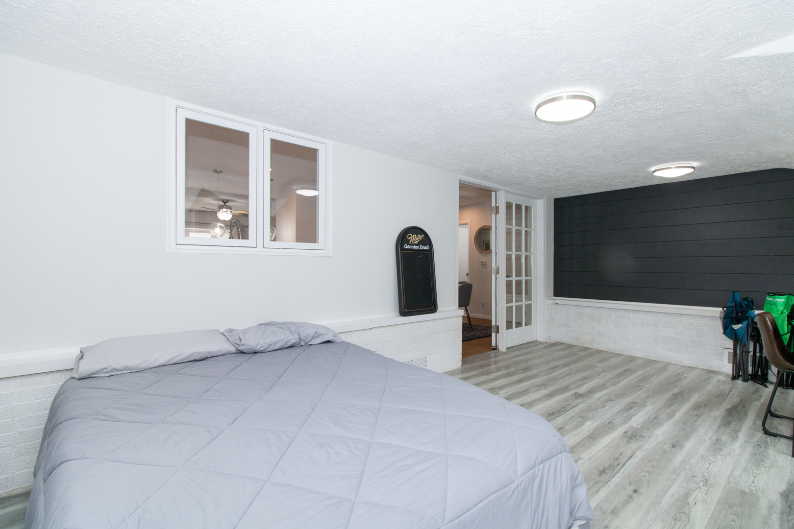 1501 Searle Drive Normal, IL 61761 - Photo 26 of 31 a bedroom with a bed and a potted plant