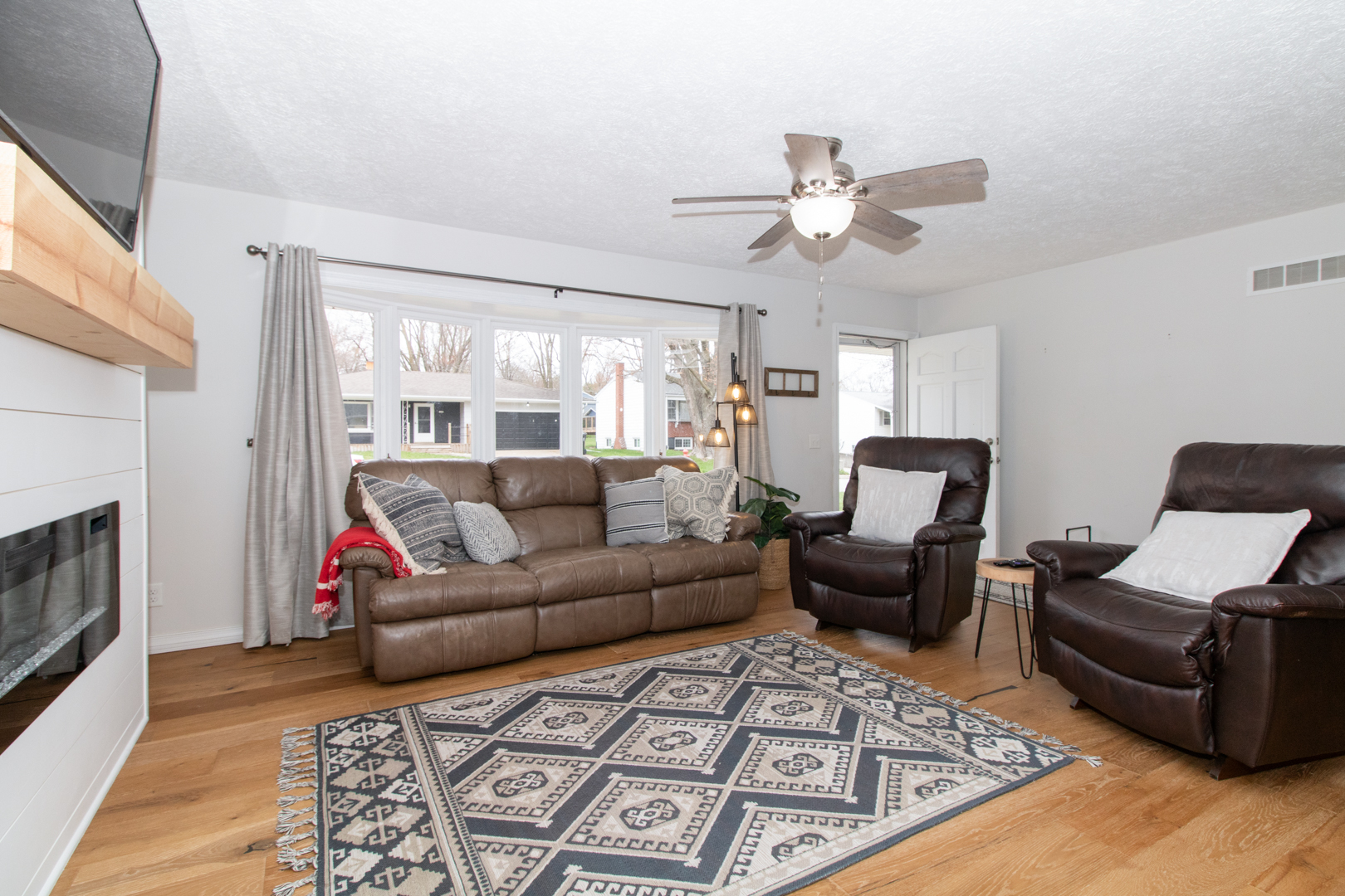 1501 Searle Drive Normal, IL 61761 - Photo 4 of 31 a living room with furniture and a fireplace