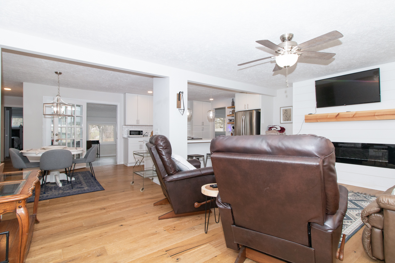 1501 Searle Drive Normal, IL 61761 - Photo 8 of 31 a living room with furniture and a flat screen tv