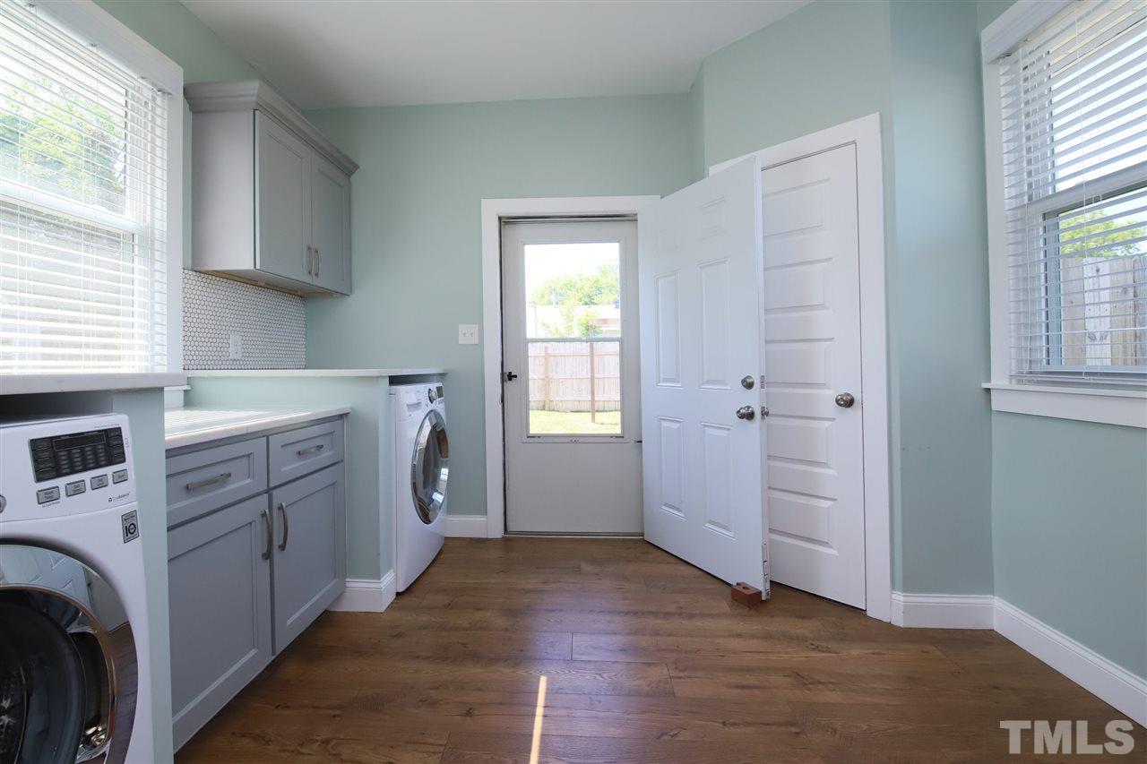 1308 East Lane Street Raleigh, NC 27610 - Photo 13 of 21 a view of utility room with washer and dryer