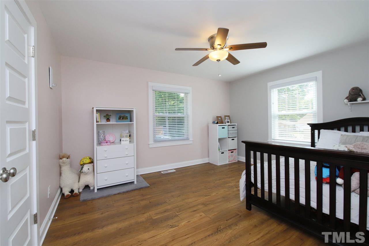 1308 East Lane Street Raleigh, NC 27610 - Photo 19 of 21 a view of livingroom with furniture and windows