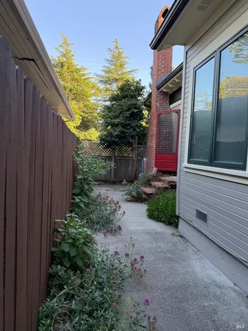 a backyard of a house with lots of green space