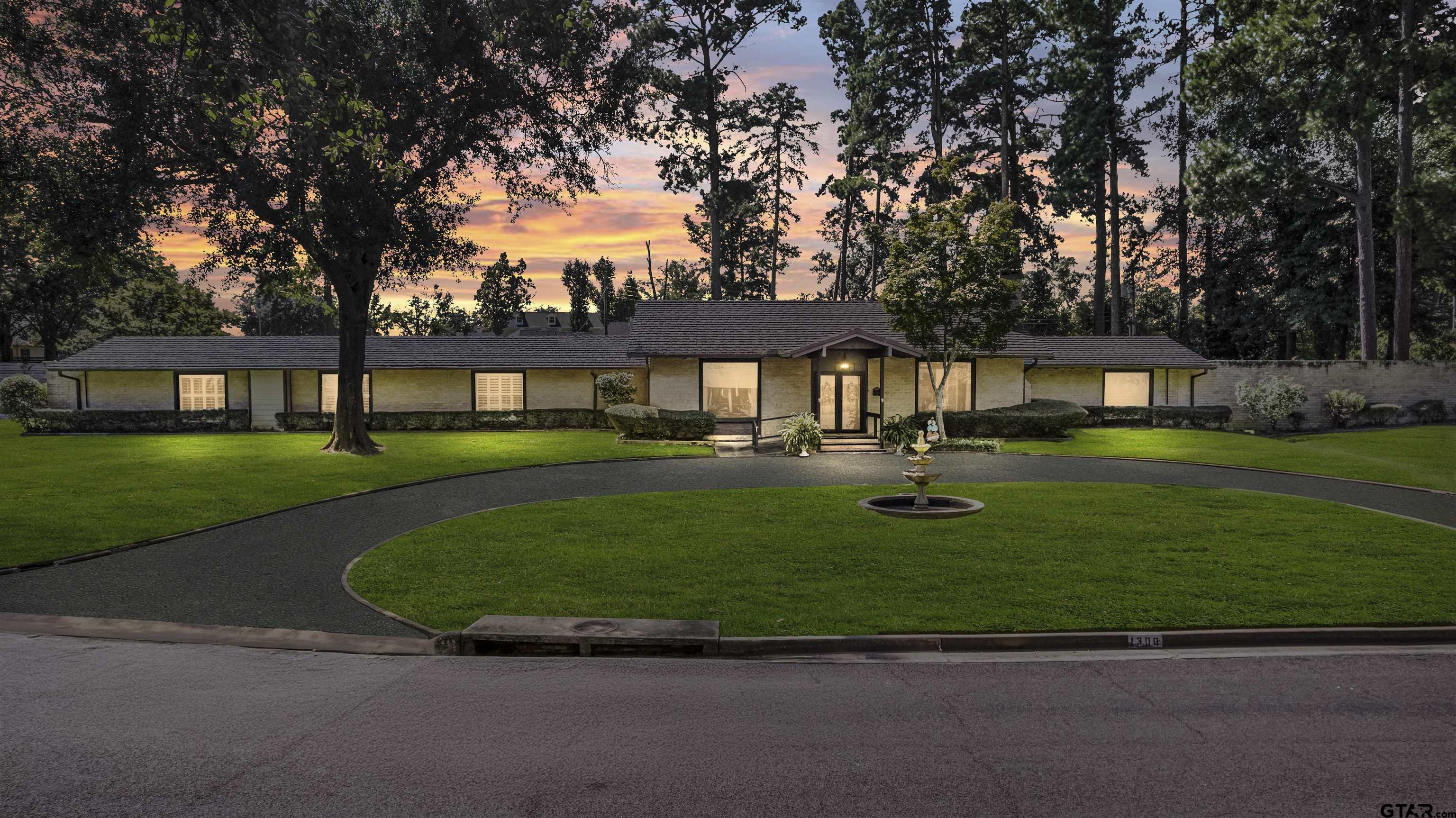 a view of a house with a big yard