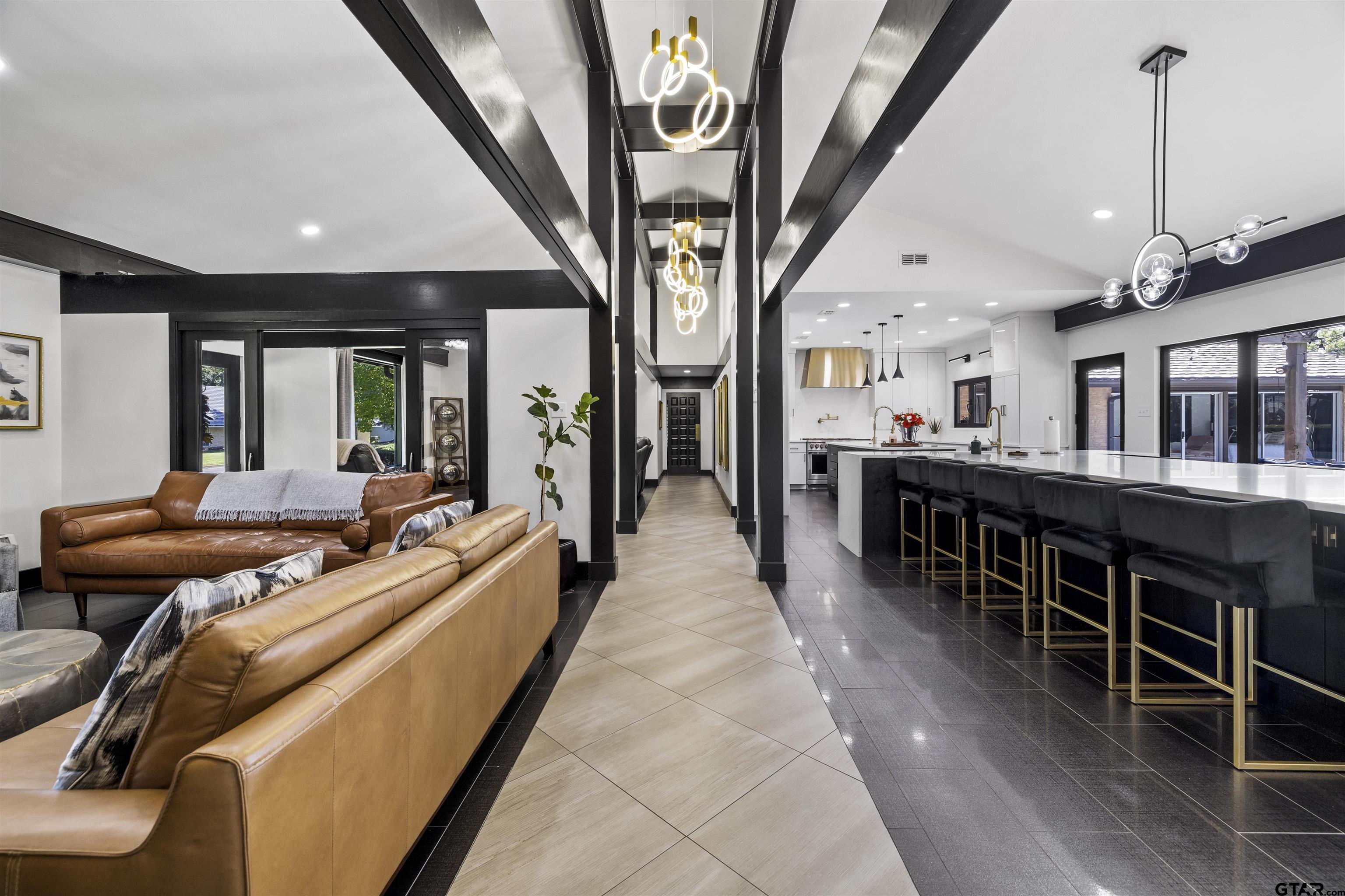 1300 Montclair Street Longview, TX 75601 - Photo 12 of 40 a lobby with furniture and stairs