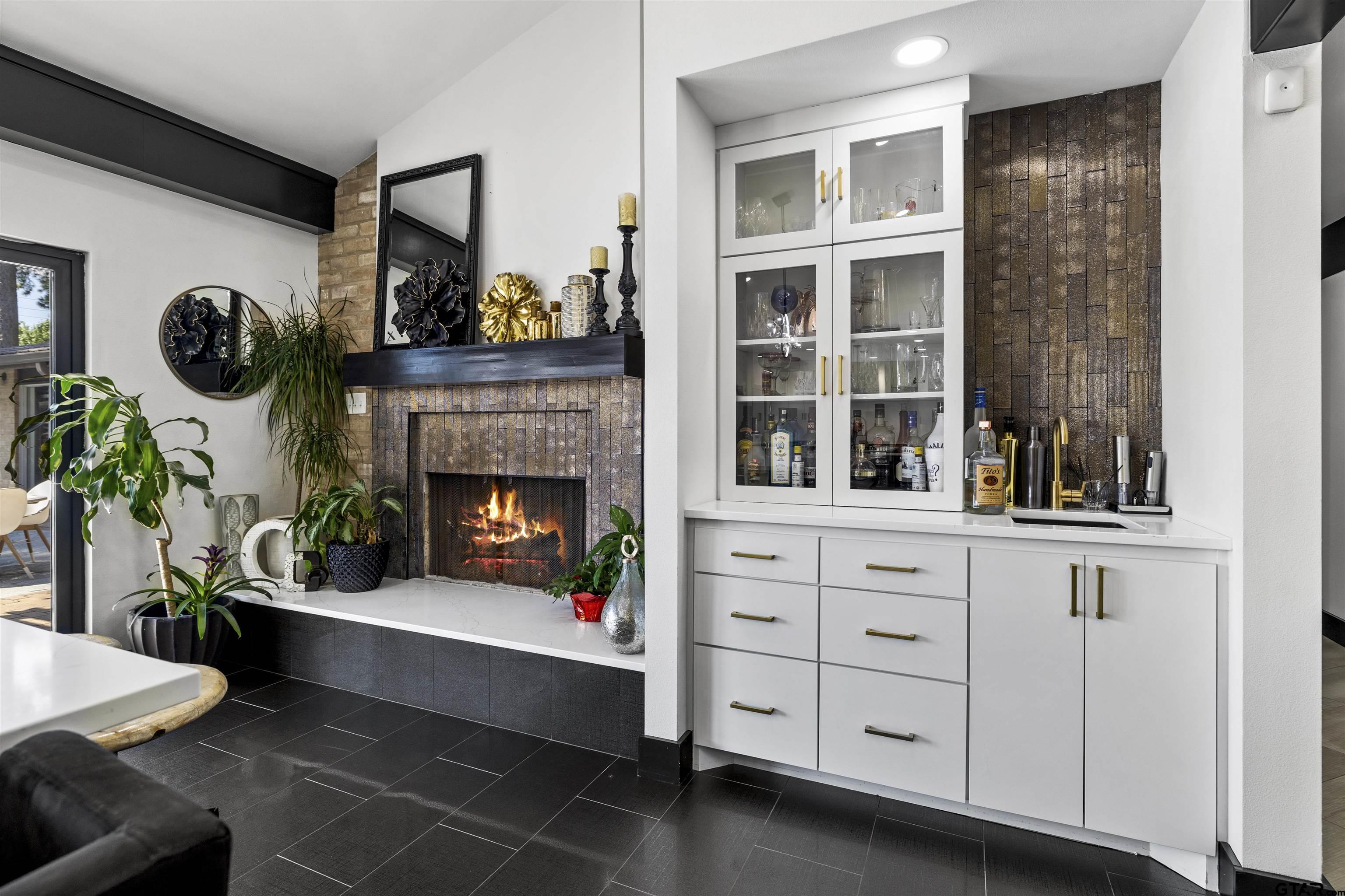 1300 Montclair Street Longview, TX 75601 - Photo 24 of 40 a living room with furniture and a fireplace