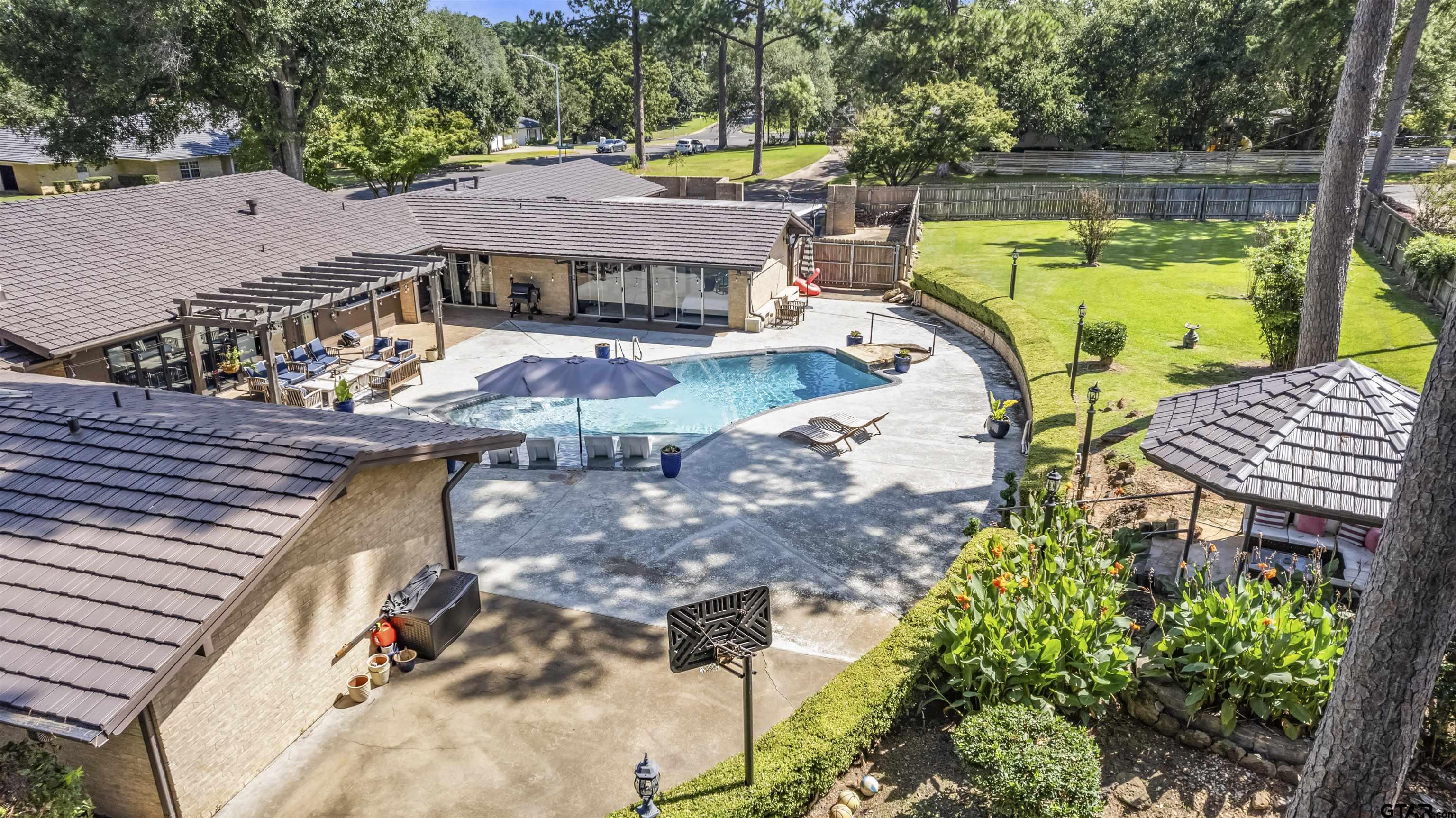 1300 Montclair Street Longview, TX 75601 - Photo 34 of 40 an aerial view of a house with swimming pool and patio