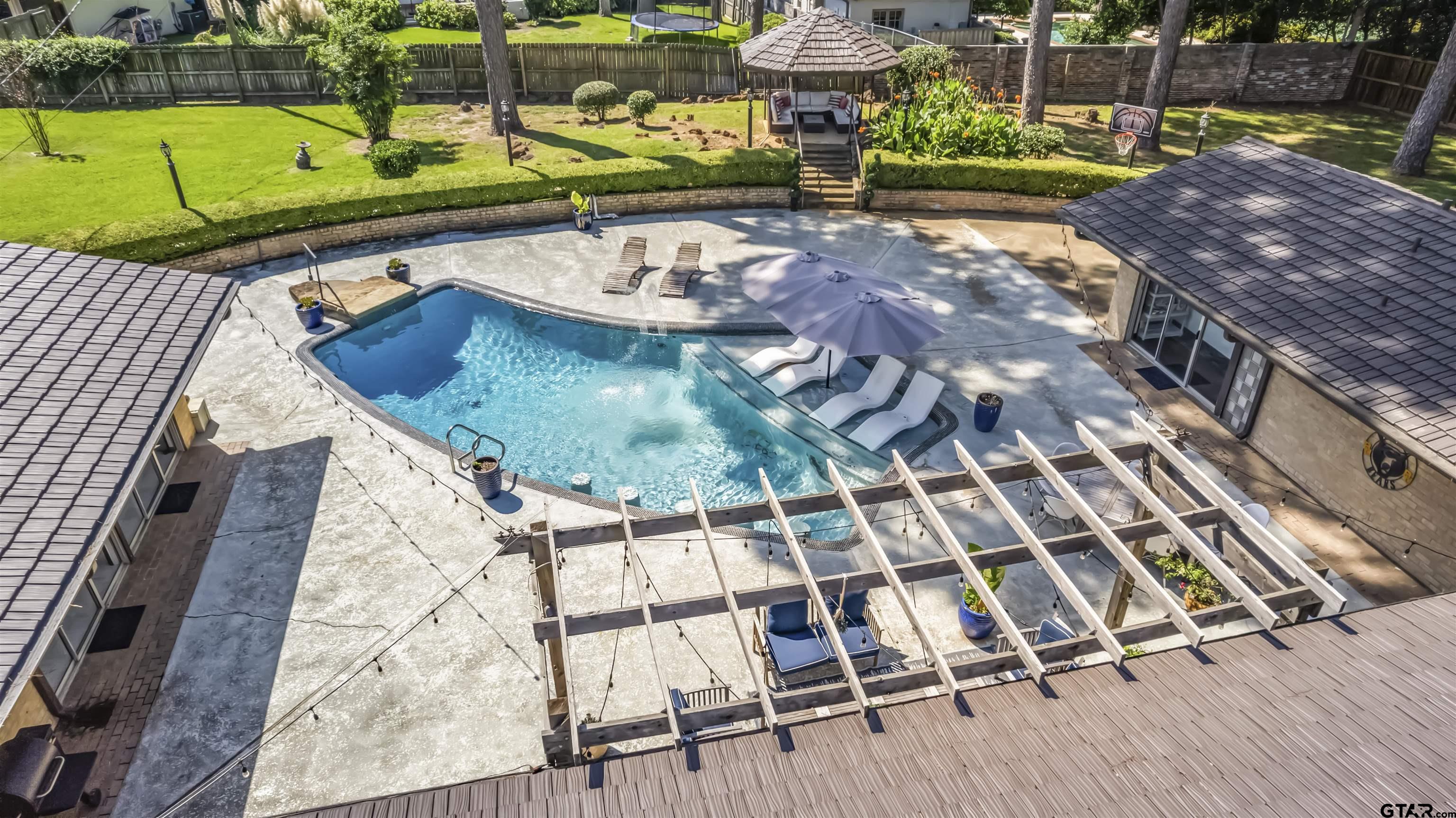 1300 Montclair Street Longview, TX 75601 - Photo 35 of 40 a view of a backyard with sitting area