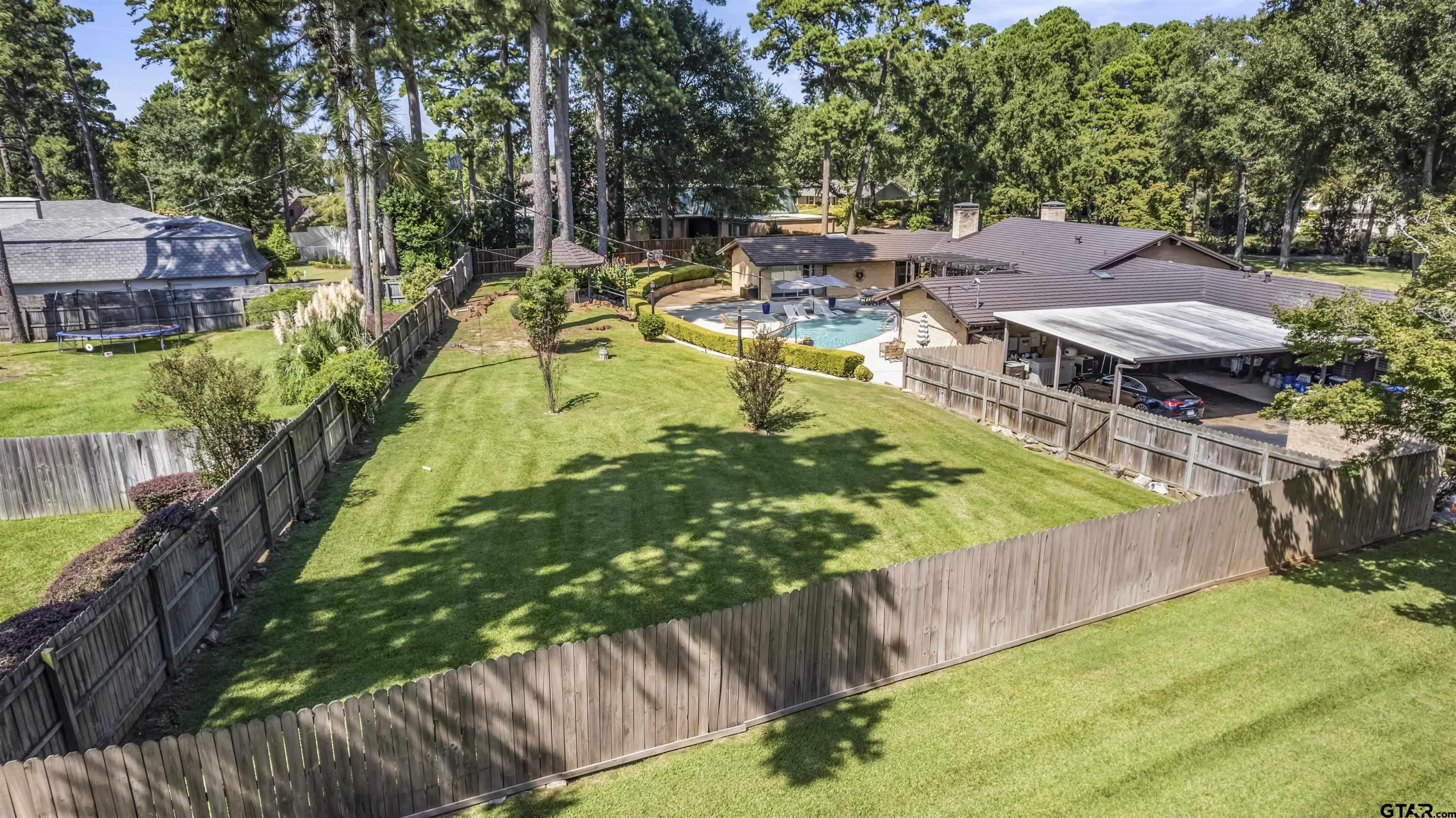 1300 Montclair Street Longview, TX 75601 - Photo 38 of 40 a view of a swimming pool with a patio
