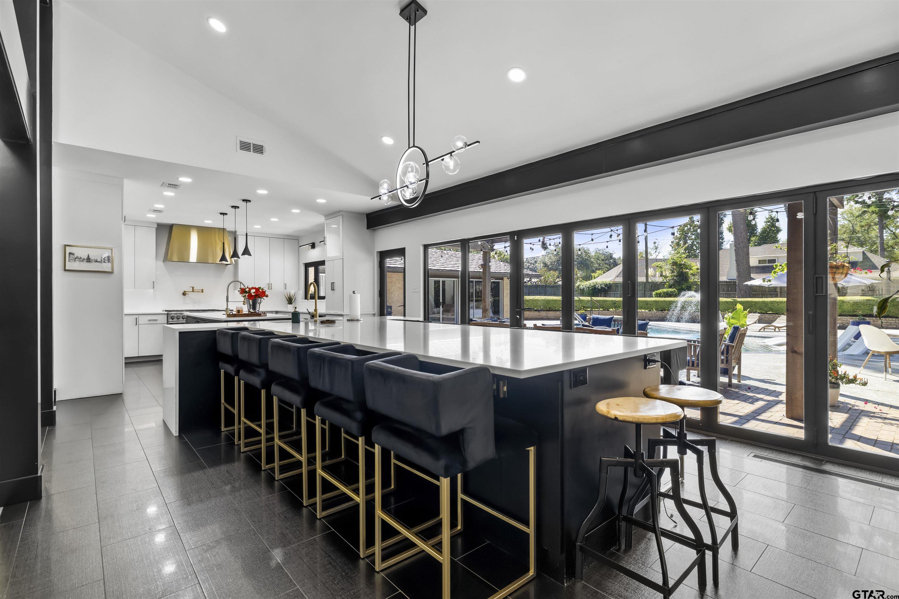 1300 Montclair Street Longview, TX 75601 - Photo 4 of 40 a view of a dining room with furniture window and wooden floor