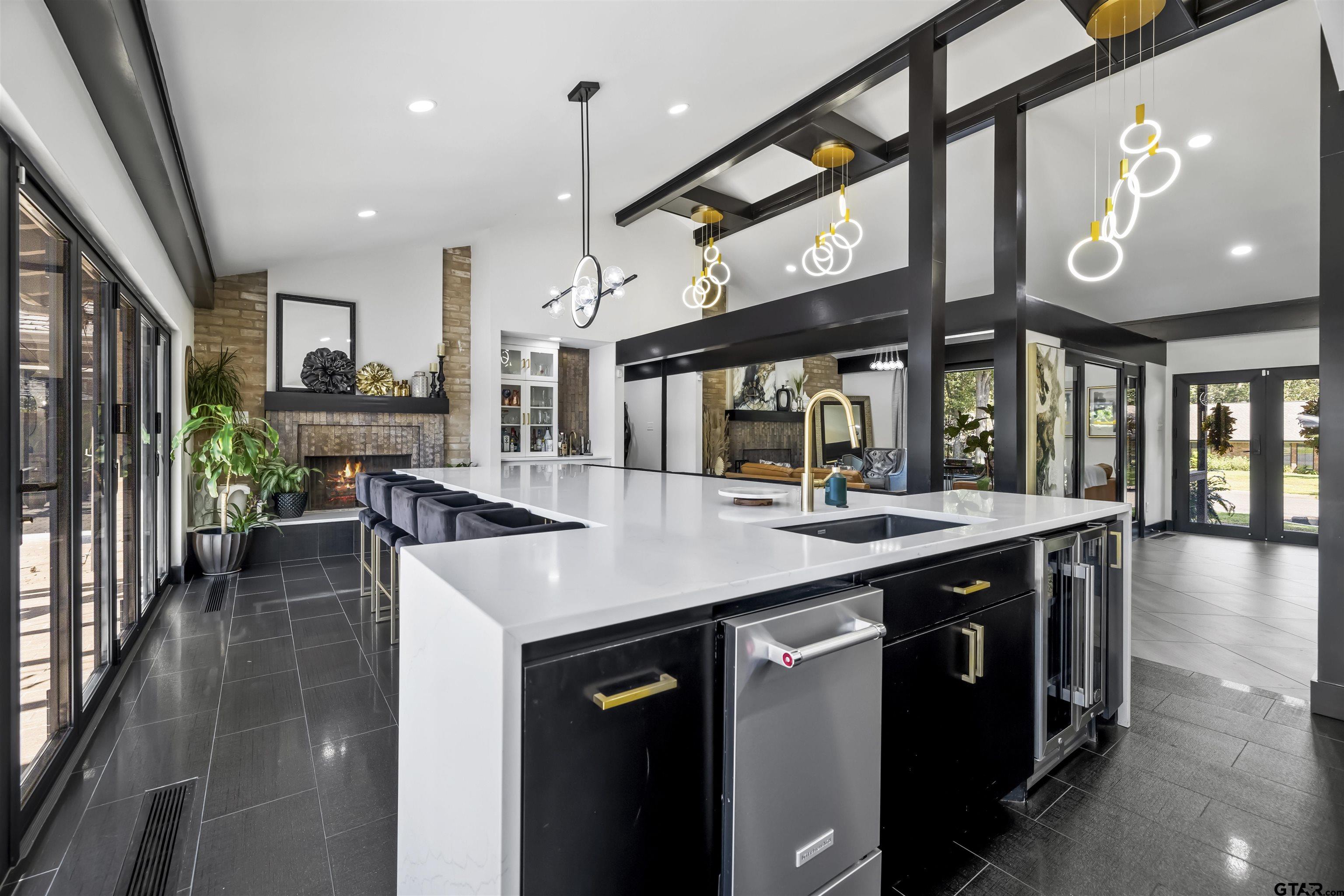 1300 Montclair Street Longview, TX 75601 - Photo 6 of 40 a kitchen with lots of counter space and glass door