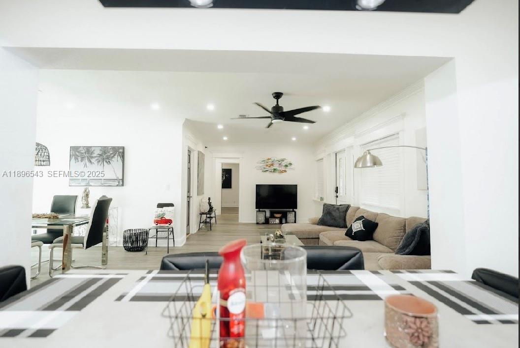 867 Northwest 4th Avenue Homestead, FL 33030 - Photo 4 of 17 a living room with furniture and a flat screen tv