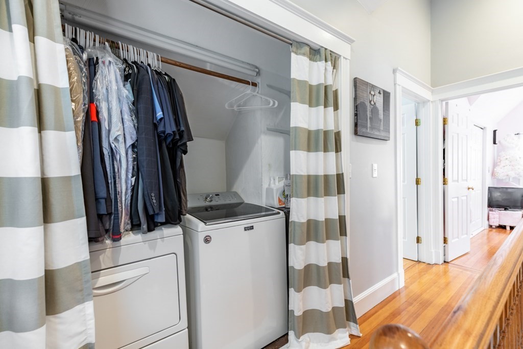 272 River Road Winthrop, MA 02152 - Photo 15 of 42 a view of walk in closet with clothes and shoes
