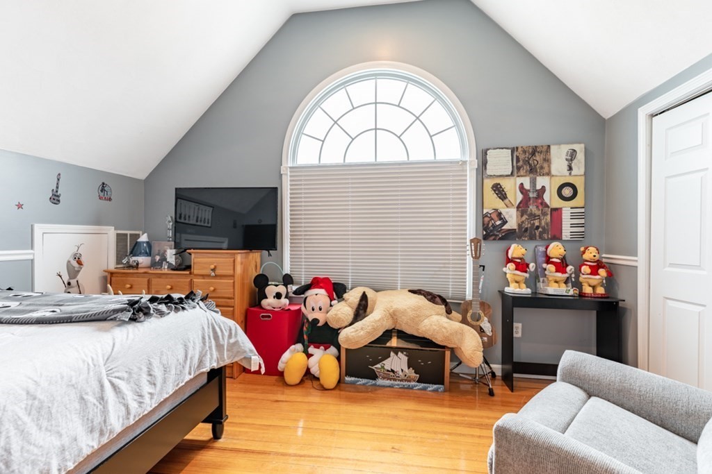 272 River Road Winthrop, MA 02152 - Photo 19 of 42 a bedroom with bed and a couch