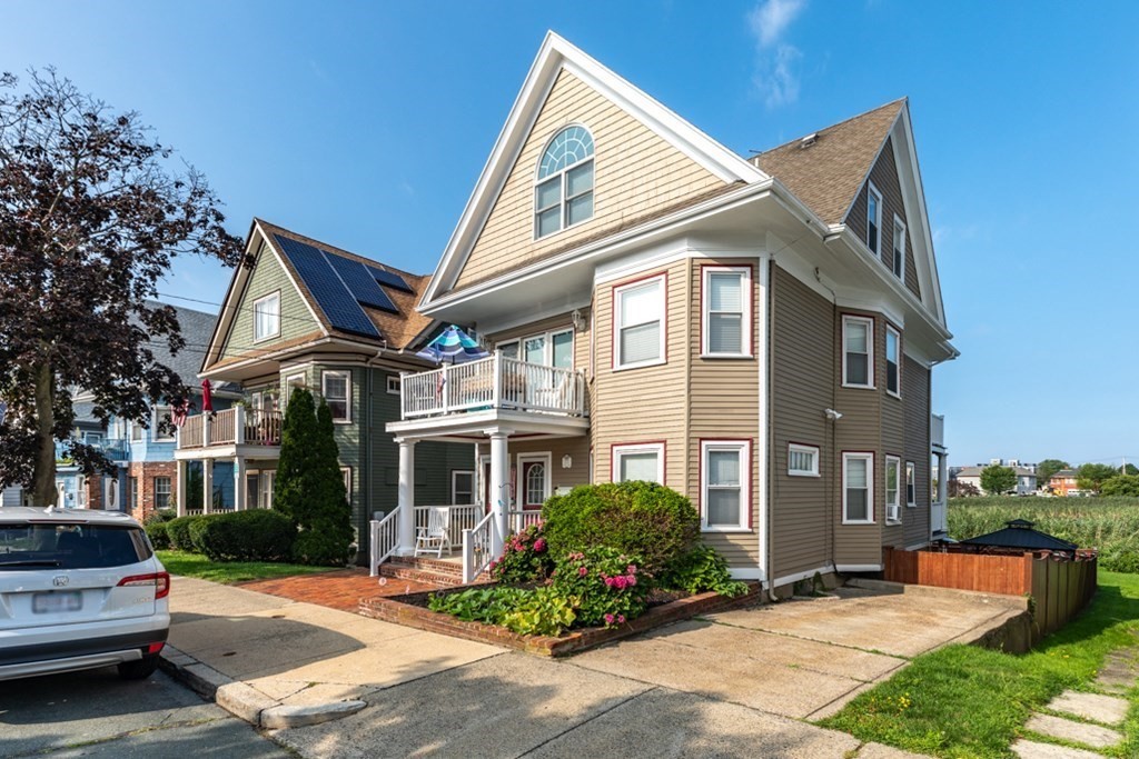 272 River Road Winthrop, MA 02152 - Photo 2 of 42 a front view of a house with a yard