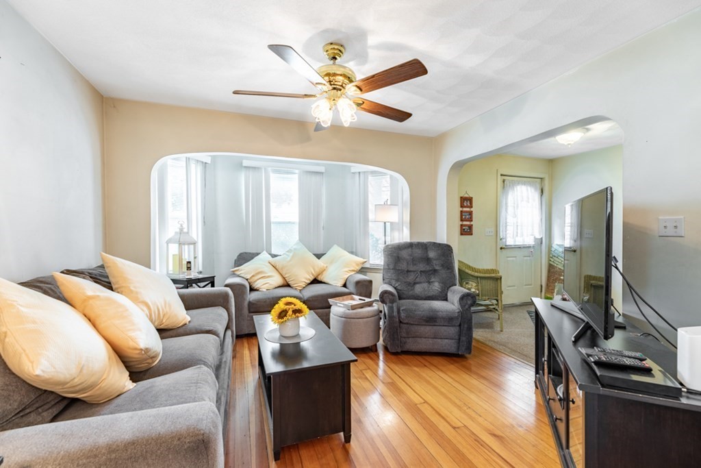 272 River Road Winthrop, MA 02152 - Photo 23 of 42 a living room with furniture ceiling fan and a window