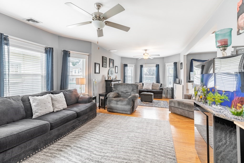 272 River Road Winthrop, MA 02152 - Photo 10 of 42 a living room with furniture and a large window