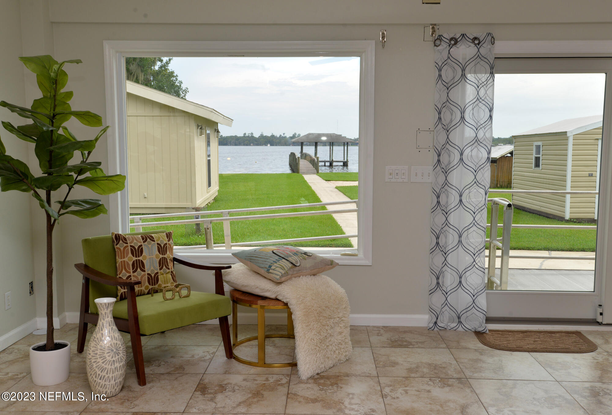 2976 Magnolia Road Orange Park, FL 32065 - Photo 18 of 44 a room with furniture and a window