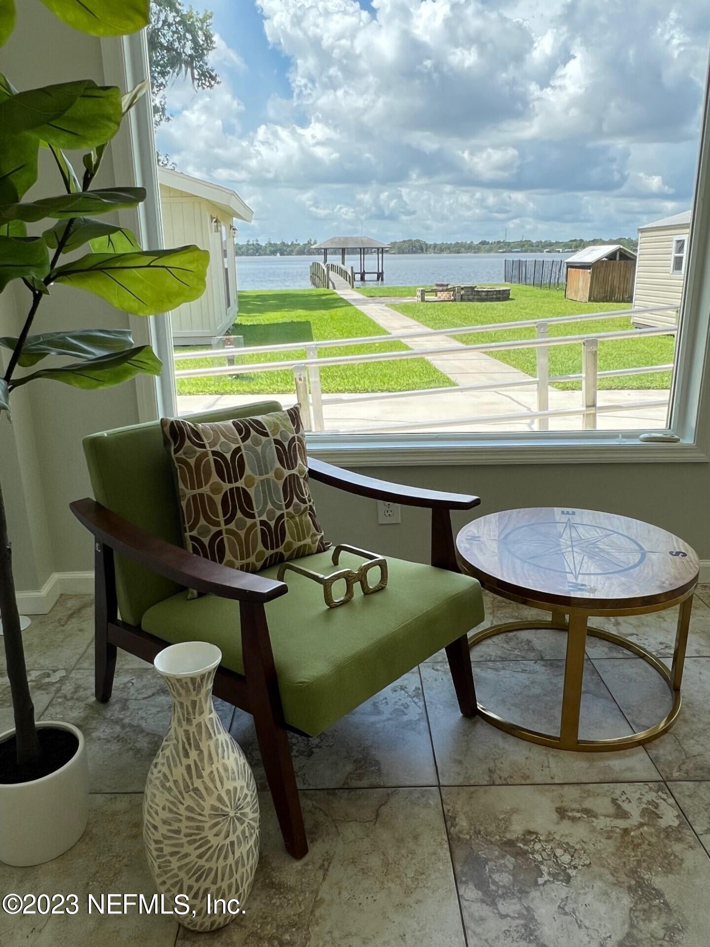 2976 Magnolia Road Orange Park, FL 32065 - Photo 19 of 44 a view of a chairs and table in kitchen