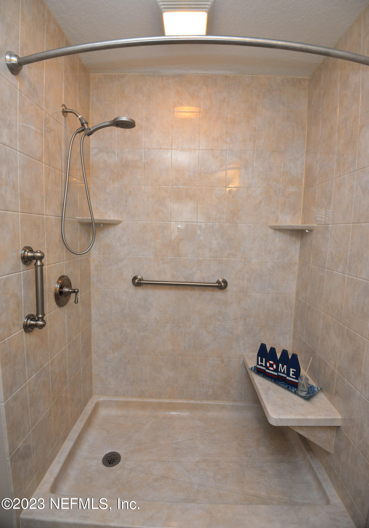 2976 Magnolia Road Orange Park, FL 32065 - Photo 23 of 44 a bathroom with a shower and a shower