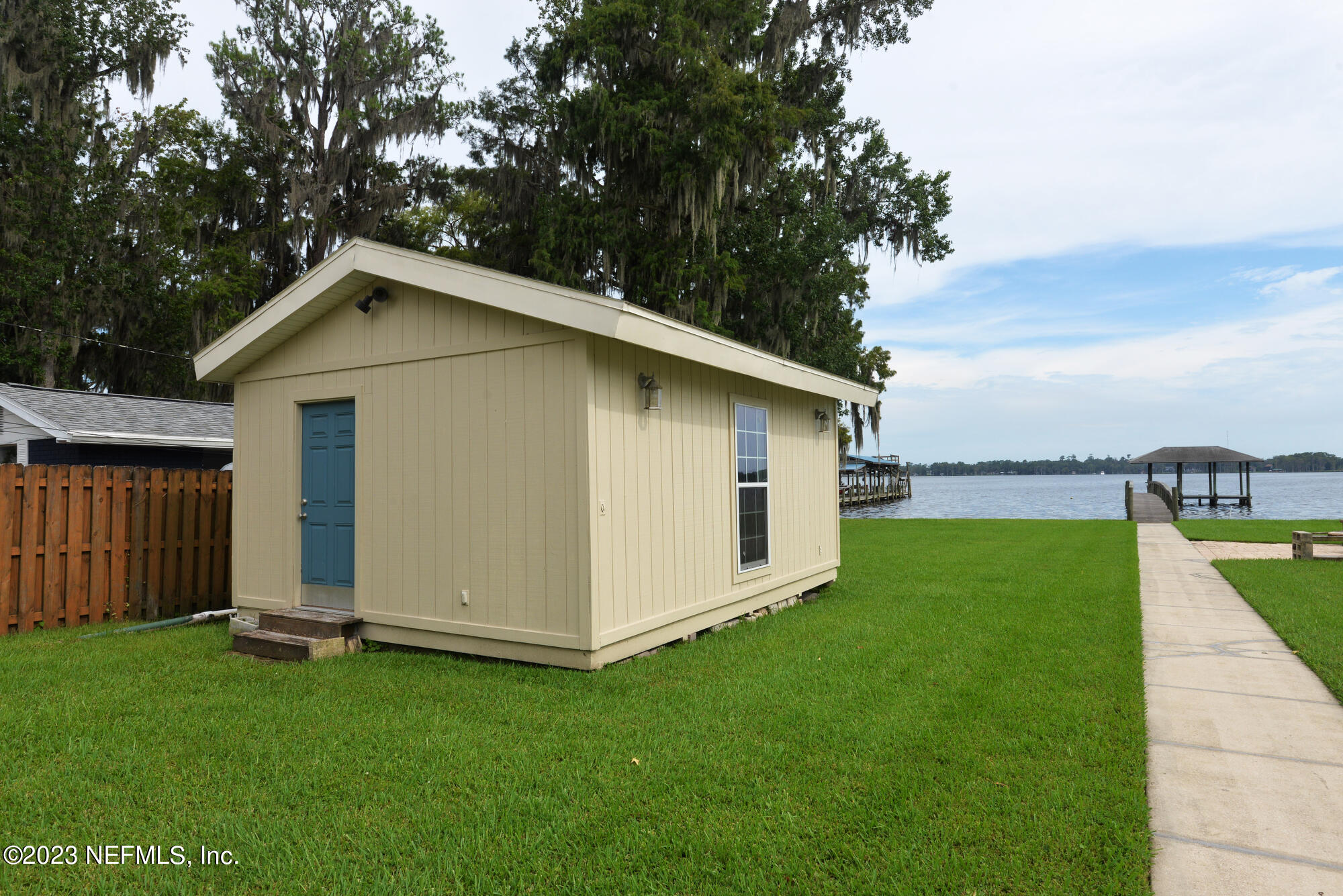2976 Magnolia Road Orange Park, FL 32065 - Photo 29 of 44 a view of a house with a backyard
