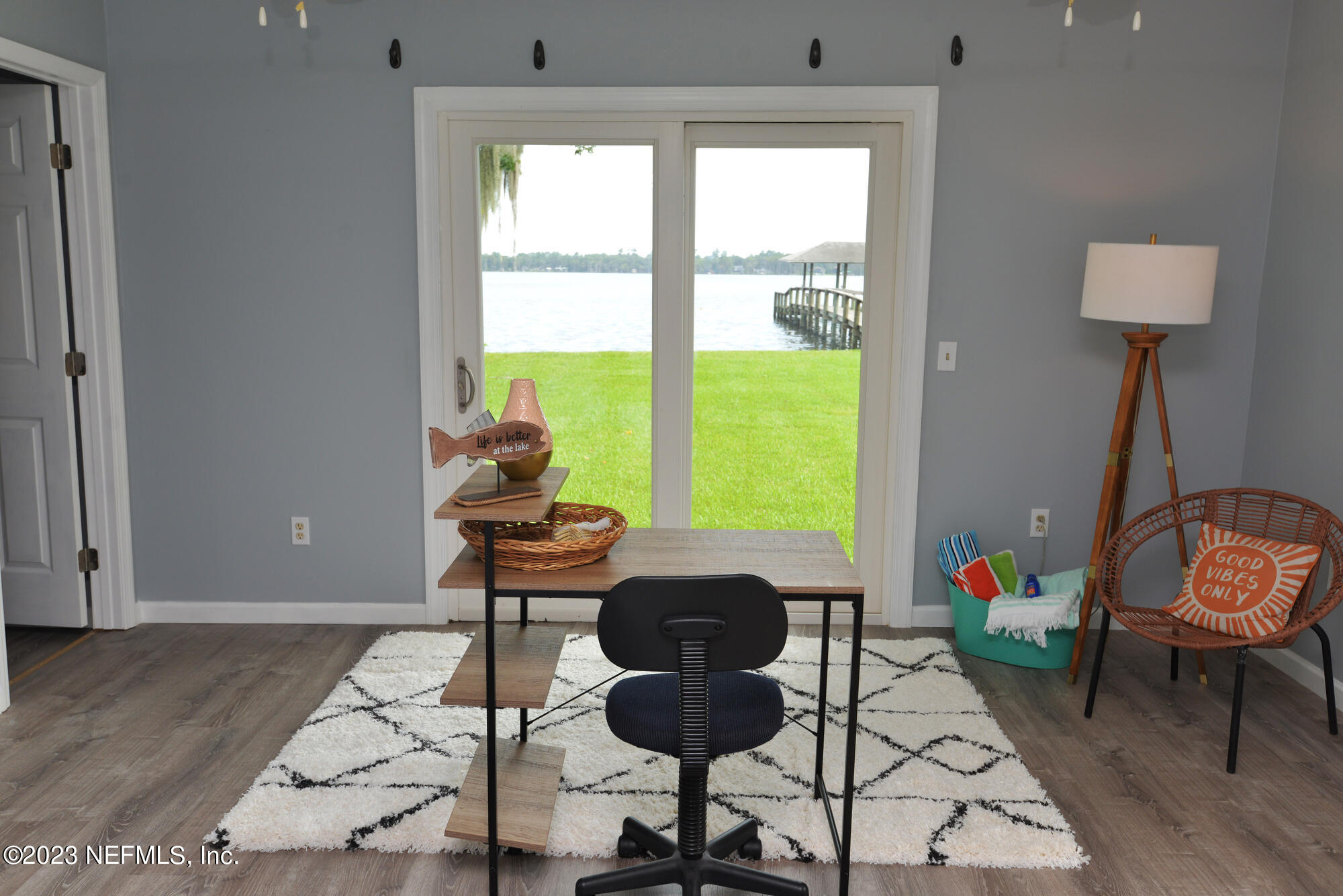 2976 Magnolia Road Orange Park, FL 32065 - Photo 30 of 44 a living room with furniture and a window