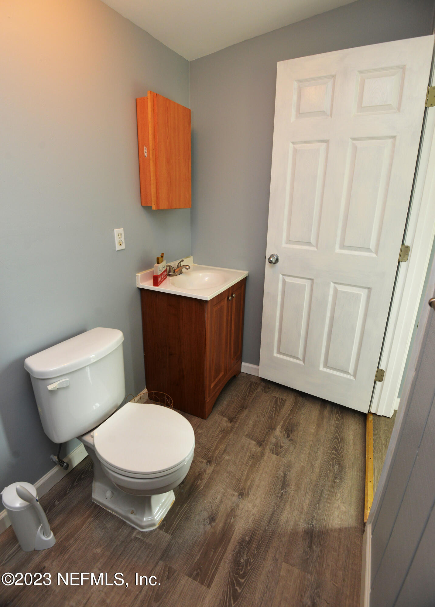 2976 Magnolia Road Orange Park, FL 32065 - Photo 32 of 44 a bathroom with a toilet and a sink