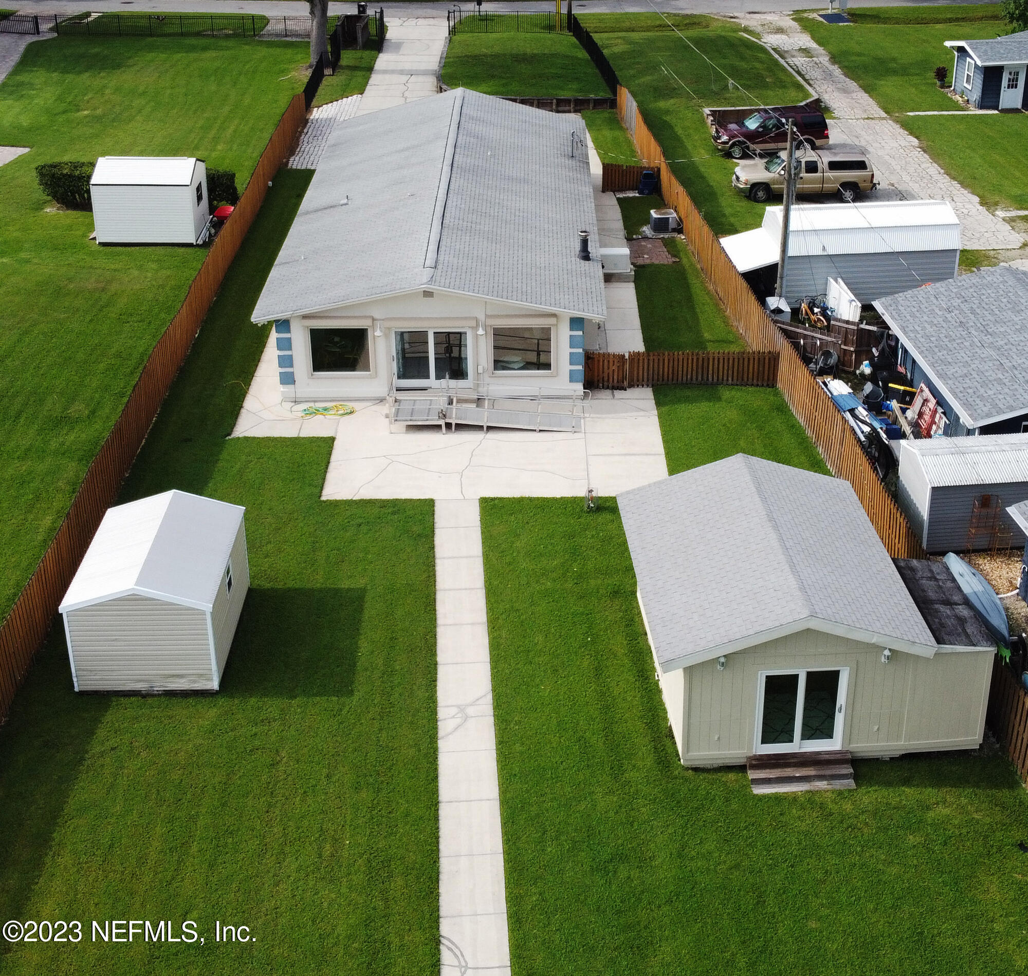 2976 Magnolia Road Orange Park, FL 32065 - Photo 35 of 44 an aerial view of a house with swimming pool garden and patio