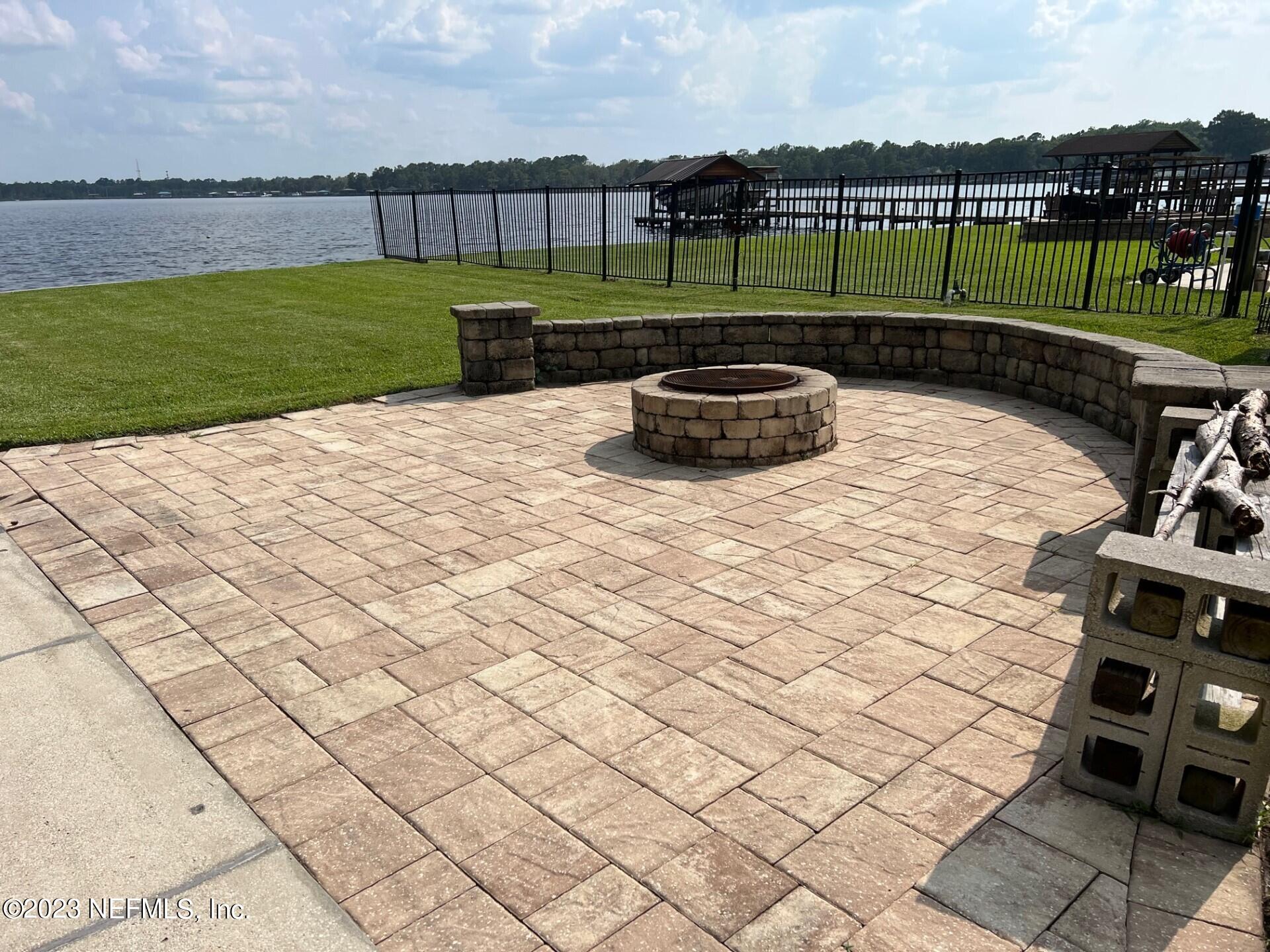2976 Magnolia Road Orange Park, FL 32065 - Photo 36 of 44 a view of a garden and patio