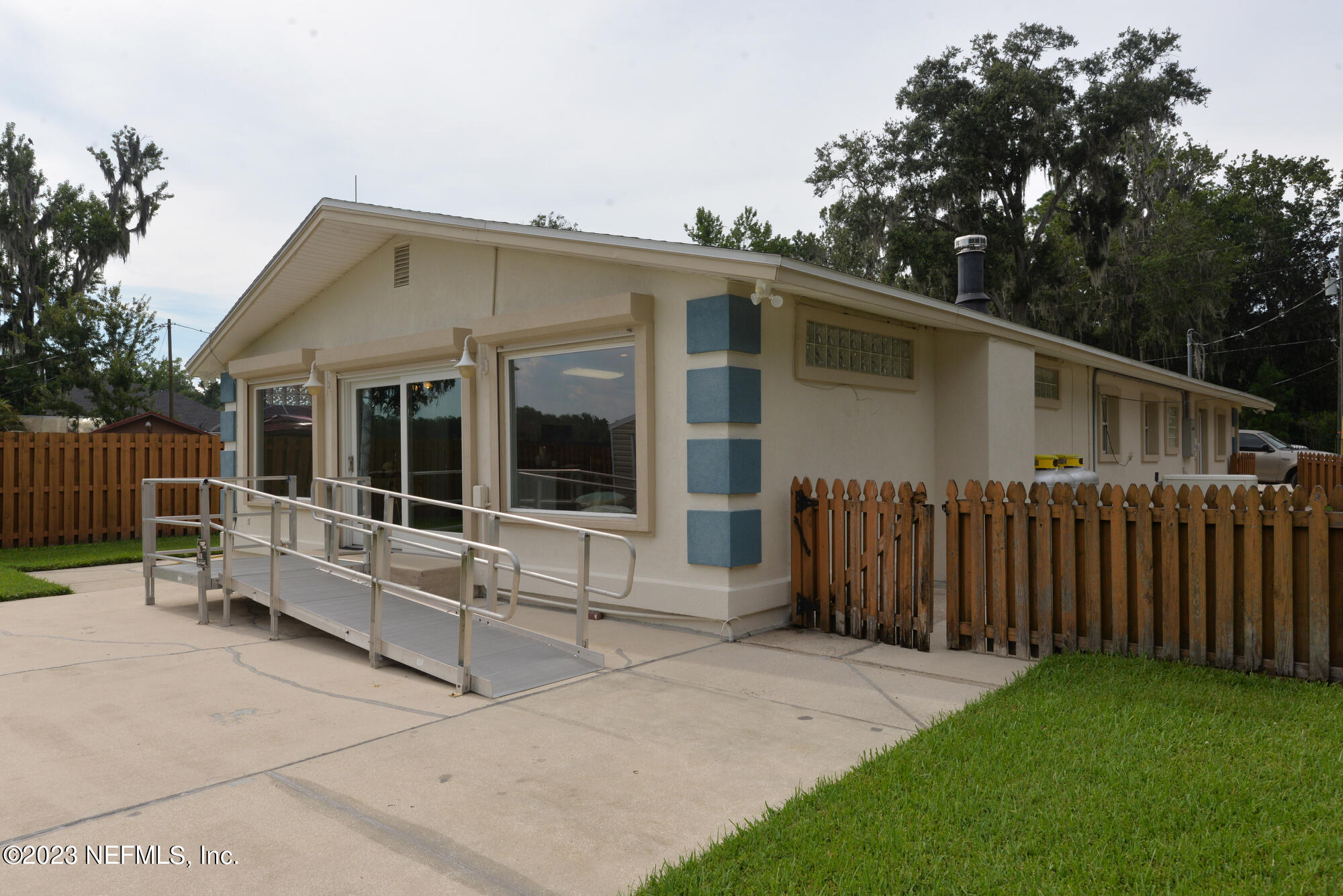 2976 Magnolia Road Orange Park, FL 32065 - Photo 40 of 44 a view of house with backyard and deck