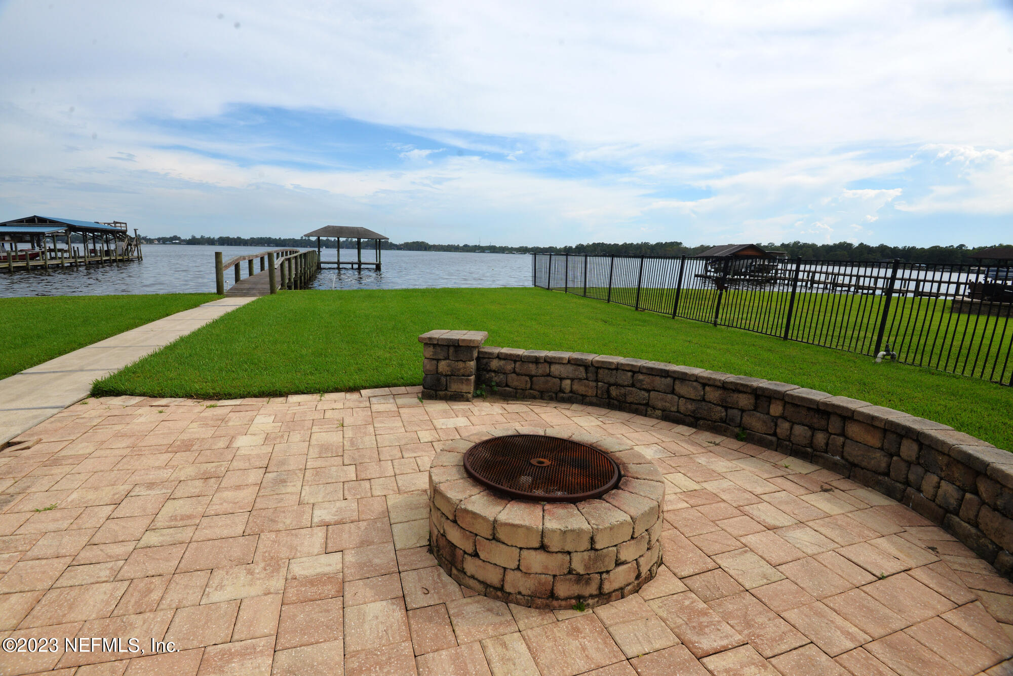 2976 Magnolia Road Orange Park, FL 32065 - Photo 44 of 44 a view of a backyard with sitting area