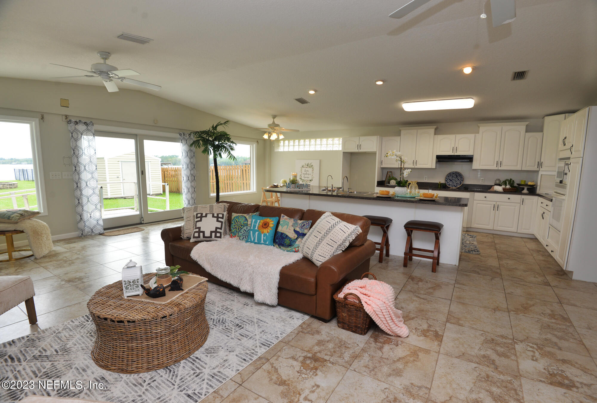 2976 Magnolia Road Orange Park, FL 32065 - Photo 6 of 44 a living room with hard wood flooring and furniture