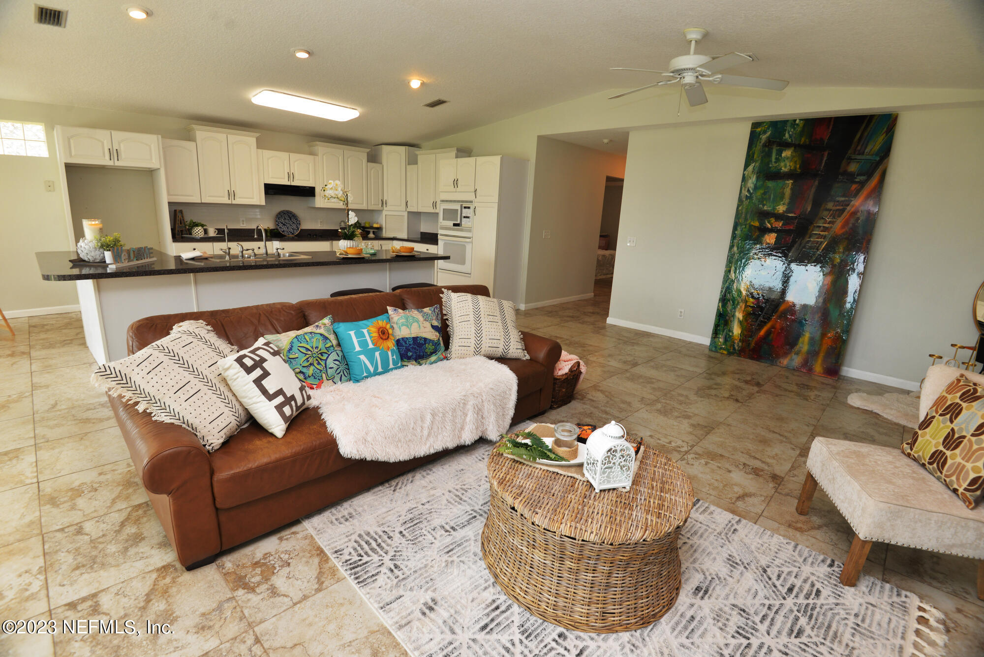 2976 Magnolia Road Orange Park, FL 32065 - Photo 7 of 44 a living room with furniture and kitchen view