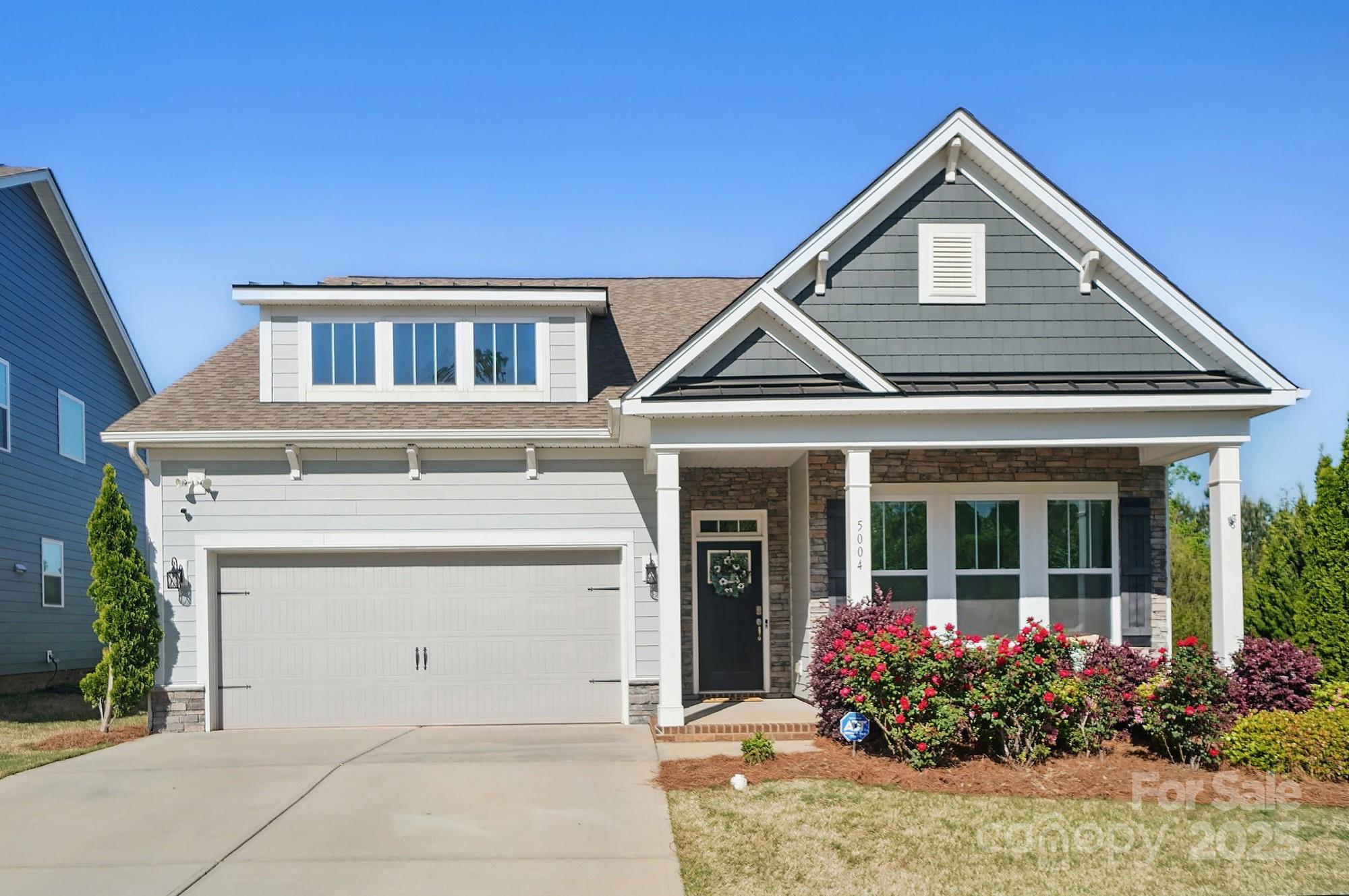 5004 Oakmere Road Waxhaw, NC 28173 - Photo 1 of 48 a front view of a house with a yard