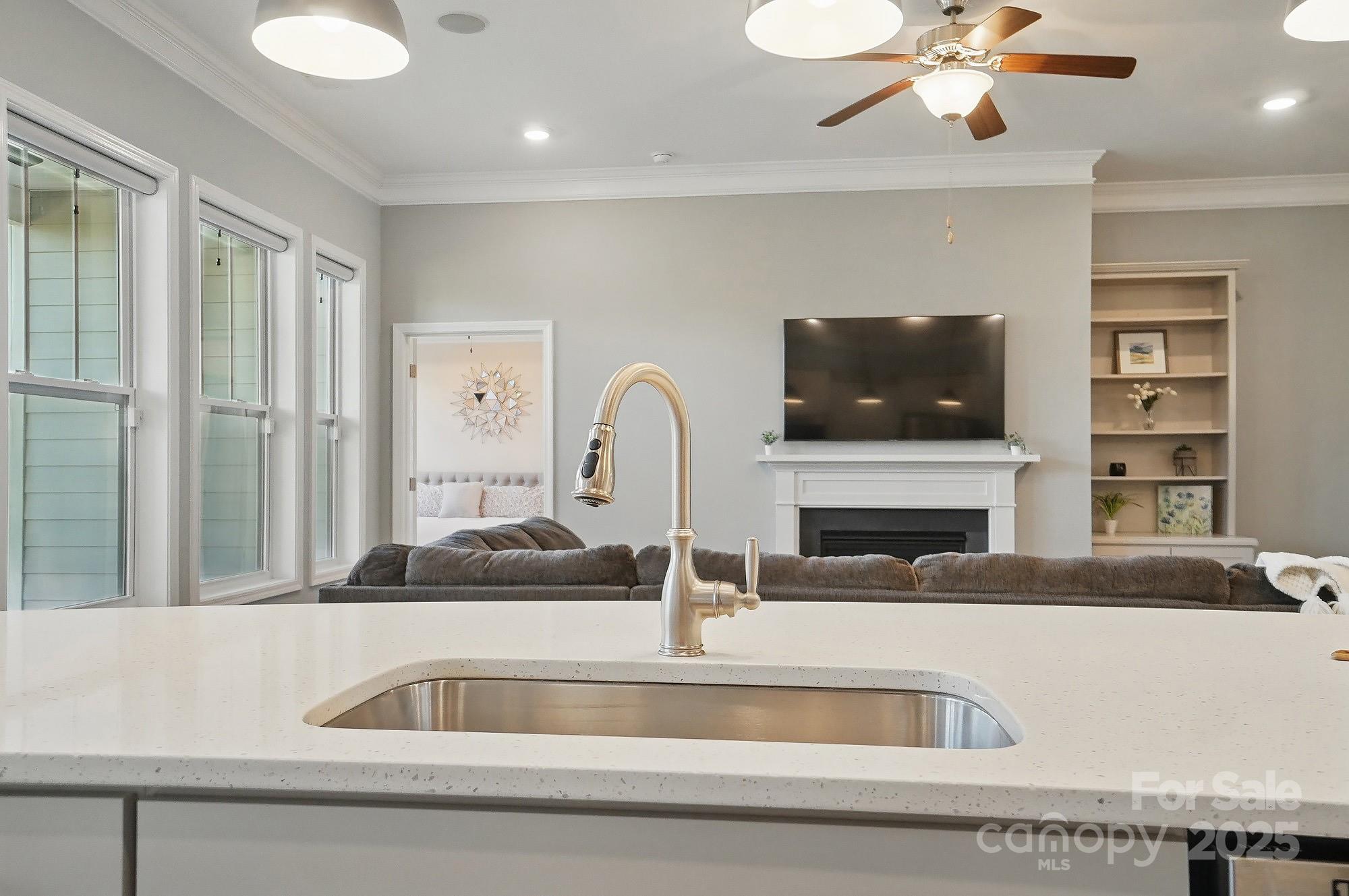 5004 Oakmere Road Waxhaw, NC 28173 - Photo 12 of 48 a kitchen with a sink and a microwave