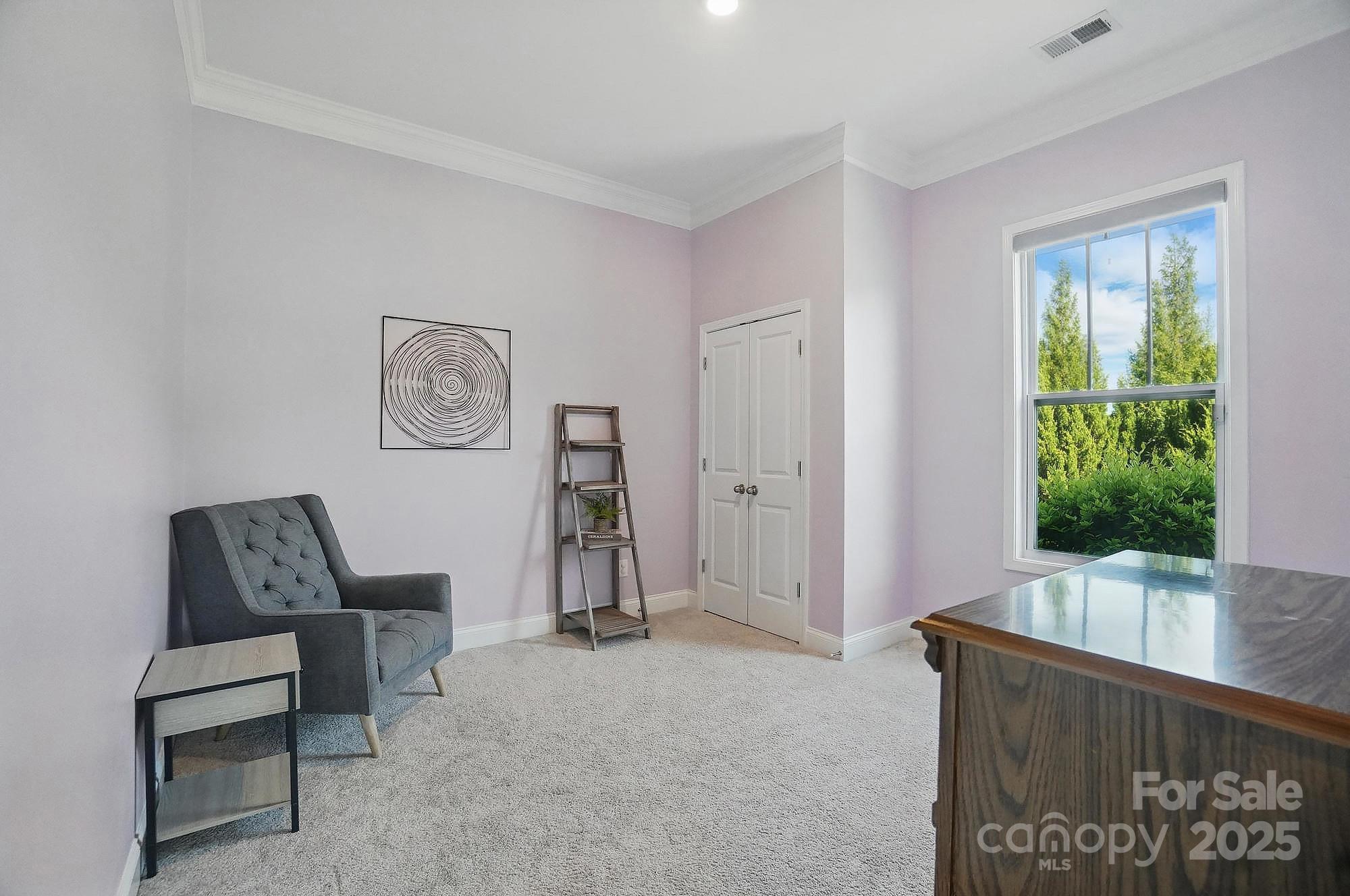 5004 Oakmere Road Waxhaw, NC 28173 - Photo 28 of 48 a living room with furniture and a window