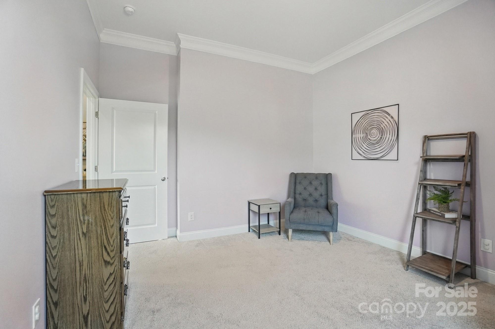 5004 Oakmere Road Waxhaw, NC 28173 - Photo 29 of 48 a room with furniture and a mirror